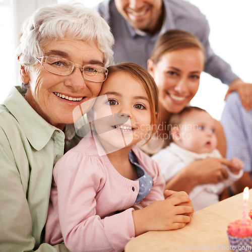 Image of Family, grandmother or young child for birthday, cupcake and candle for celebration. Smile, home and grand daughter with grandma, senior and children at event, parents and baby in household party