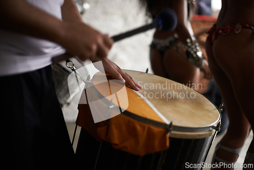 Image of Drummer, hands and music with percussion drums on stage, rhythm and person with talent in band. Creative people, beat and performing in group as professional musician and energy for entertainment