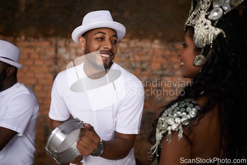 Image of Drummer, playing and music with dancer by stage, rhythm and brazilian people with talent in band. Carnival, beat and performing in group as professional musician and happy for live show performance