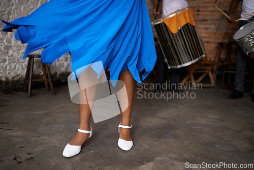 Image of Closeup, woman and leg with dress for ballroom dancing, samba or salsa in live show at nightclub. Female person, dancer and performer with energy, action and movement for Brazilian music concert