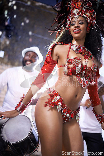 Image of Black woman, happy and samba with band at night for carnival season celebration in Rio de janeiro with sequins costumes. Female person, dancing and fun at festival with unique fashion for culture