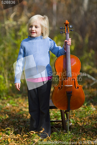 Image of Child Standing With Cello