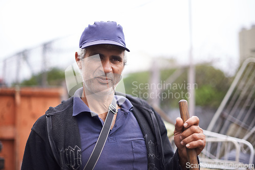 Image of Man, portrait and street cleaner in city for urban trash or garbage pollution for sweeping, service or waste management. Male person, face and broom in Latin America for rubbish dirt, junk or refuse