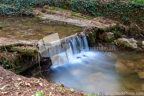 Image of detail of a waterfall from public park