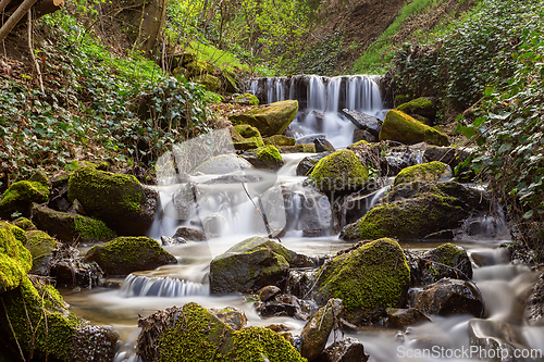 Image of waterfalls along a mountain stream