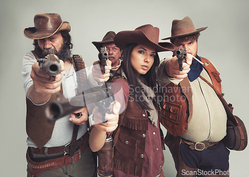 Image of Bandit group, portrait and cowboys with weapon, aimed and Halloween on white background. Wild western, costume and characters of Texas criminals, comic and vintage for old west theme with studio gun