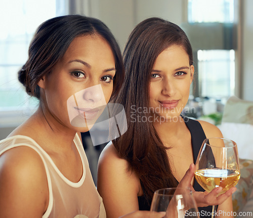 Image of Happy women, portrait and elegant with wine in hotel, confidence and bonding together for gala event. Friends, alcohol glass and smile face for style clothes with care and relax for formal party