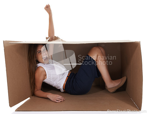 Image of Portrait, winner and woman breaking box in studio isolated on white background for delivery success. Goals, target and victory with fist of excited young person cheering or shouting for distribution