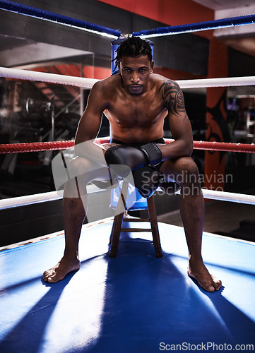 Image of Black male boxer, ring and shirtless for sport, match and portrait with braids and gym with gloves. Boxing male person, sport and training gear for mma, exercise and fitness for workout and fight