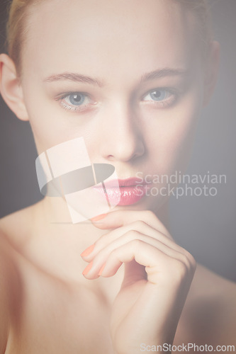 Image of Woman, beauty and portrait with skin care, makeup and cosmetics with facial glow treatment. Studio, dermatology and female person from Switzerland with skincare and wellness care with grey background