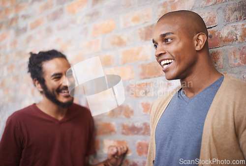 Image of Men, university and students in a hallway, conversation and funny with discussion and laughing. People, college and friends in a lobby or humor with lunch break and relaxing with planning or speaking