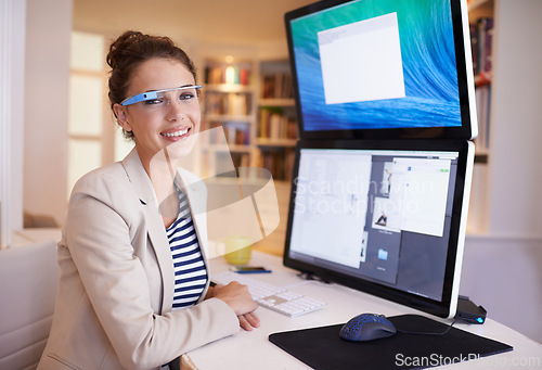 Image of Portrait, happy woman and smart glasses for business by computer at table in home office. Face, professional and creative graphic designer on desktop with future tech for remote work in Australia