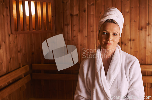 Image of Woman, portrait and spa sauna in bathrobe for accommodation hospitality, treatment or stress relief. Female person, face and towel at Bali resort for holiday vacation with wellness, care or relax