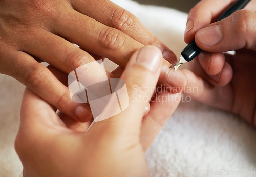 Image of Hands, manicure and cuticle for nails in salon, beauty and treatment to relax. Closeup, spa and tool on fingernail, cleaning and cosmetic service with professional, pamper and luxury for wellness