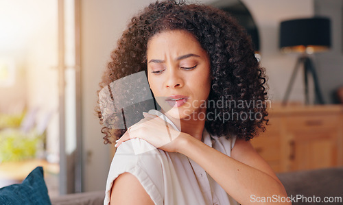Image of Woman, shoulder pain and injury in home with stress, thinking and hand for massage for relief. Girl, person and burnout with muscle, strain or arthritis with ideas, rub or sad in morning at apartment