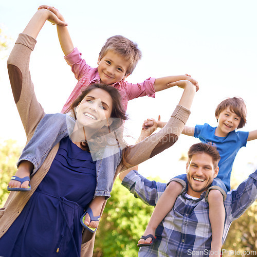 Image of Smile, nature and children on parents shoulders in outdoor park or field for playing together. Happy, bonding and low angle portrait of mother and father carrying boy kids for fun in garden in Canada