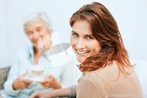 Image of Portrait, mother and daughter with coffee in happiness for bonding, outdoor and support with care. Family, women and together at home with smile on break for visit, joy and love to create memories