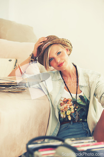 Image of Woman, hat and record with portrait, retro and living room floor for relaxation. Person, couch and vintage for hobby, happiness and stress relief with trendy music and summer recreation with style