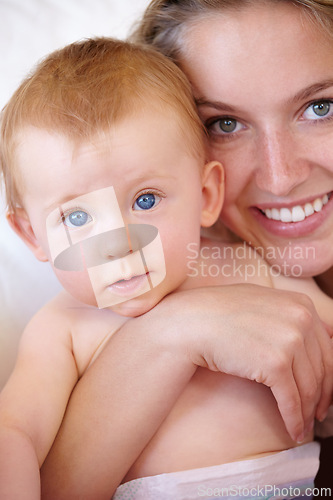 Image of Portrait, hug and family with baby, mother and home with comfort, nurture and bonding together. Apartment, mama or infant with care or relationship with love or child development with support or face