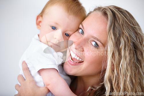 Image of Happy mother, portrait and hug with baby for love in care, trust or bonding together on holiday at home. Face of mom or little toddler with smile for family, childhood or motherhood in relax at house