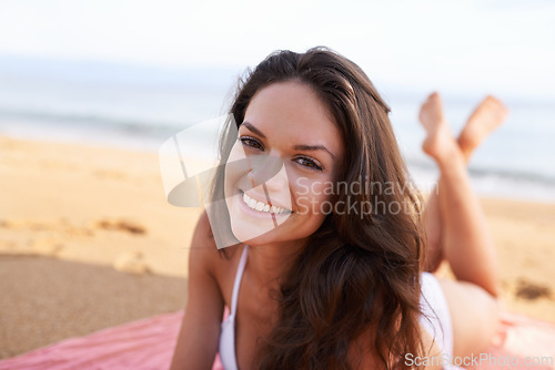 Image of Relax, portrait or happy woman at sea for travel adventure or peace on holiday vacation in Bali. Tourist, picnic or female person on sand with blanket or smile in nature for fresh air, beach or ocean