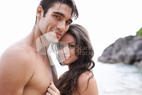 Image of Portrait, love and couple on beach with waves, travel adventure and relax on summer island holiday. Ocean vacation, happy woman and man hug in nature on romantic date together with smile in Bali.