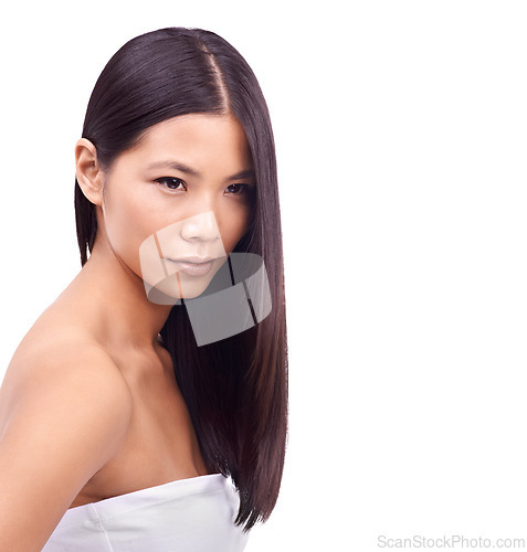 Image of Woman, brazilian and treatment for haircare in studio, beauty and pride for keratin results on mockup space. Asian female person, hair and shampoo for cosmetics, white background and conditioner