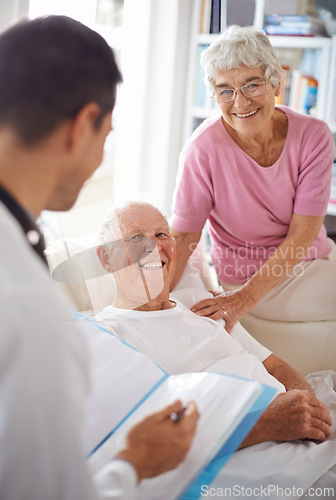 Image of Doctor, senior patient and paperwork in nursing home for wellness, diagnosis and healthcare. Consultation, medical professional and elderly couple for rehabilitation, discussion and positive report