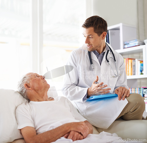 Image of Doctor, communication and elderly man on sofa with discussion, consultation or advice for treatment in hospice. Healthcare, patient and medical professional with talking for planning, help or results