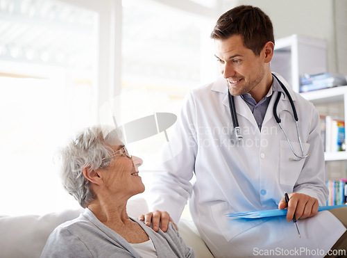 Image of Doctor, healthcare and elderly woman in hospital with trust, consultation or advice for treatment with smile. Medical professional, patient and office with support, help or happy for test results