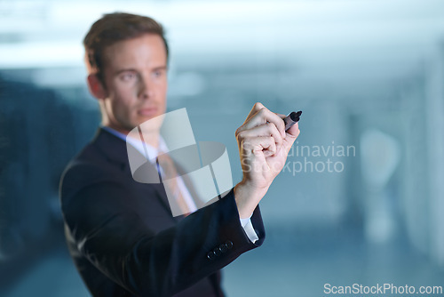 Image of Businessman, glass wall and writing or brainstorming solution as financial advisor investment, loan or budget. Male person, marker and problem solving in office or planning, development or research