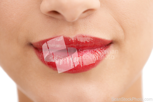 Image of Person, red lipstick and closeup of smile with makeup in cosmetics, gloss or glow in treatment. Colorful lips of woman or model in satisfaction for mouth, oral or beauty in cosmetology or dermatology