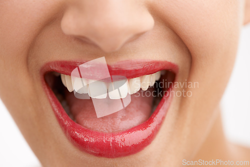 Image of Happy woman, teeth and red lipstick with makeup for beauty, cosmetics or dental care on a white studio background. Closeup of person or model in satisfaction for lip gloss, glow or tooth whitening