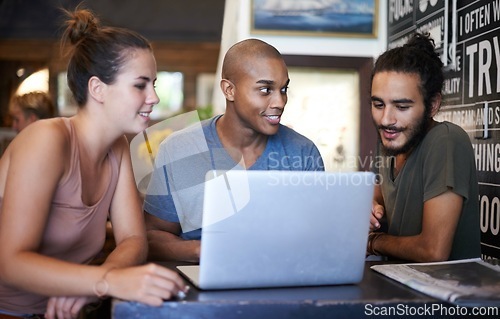 Image of Diverse, team and laptop in cafe for discussion, creative and ideas in conversation. Digital, search and information technology for colleague, teamwork and happy smile for web design on internet.