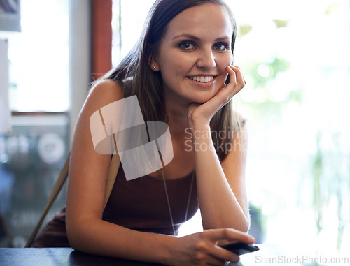 Image of Portrait, student woman and smile on campus, university and happy in school coffee shop. Female learner, gen z and young person ready for college class, lecture and with cellphone for communication