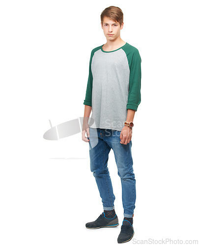 Image of Portrait, teenager and student isolated on studio background for fashion, casual and trendy clothes. Male person, youth and handsome model for funky style, contemporary looks and edgy clothing