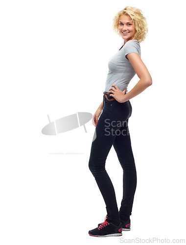 Image of Portrait, fashion and happy with casual woman in studio isolated on white background for satisfaction. Model, clothes or smile and happy confident woman in trendy clothing outfit with denim jeans