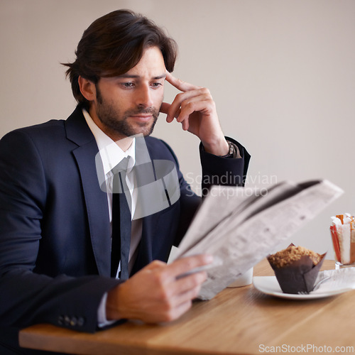 Image of Businessman, read and newspaper in coffee shop, food and relax on break from work. Male person, crypto investor and finance manager for firm, accounting and analysis stock prices and forex on lunch
