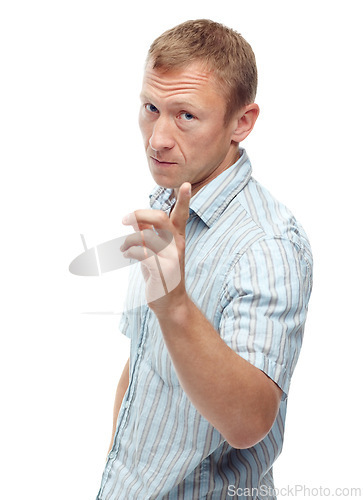 Image of Man, angry and point in studio portrait with attention, warning or frown for sign by white background. Person, frustrated and hand for icon, symbol or show danger with serious expression for attitude