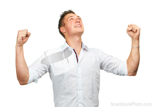 Image of Man, happy and fist celebration in studio with success, goals and financial freedom by white background. Person, winner and excited for achievement, prize and competition with cheers for giveaway
