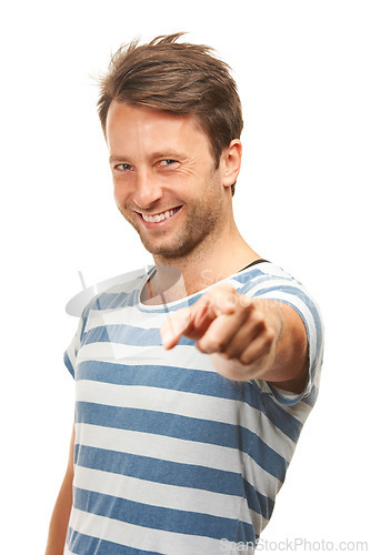 Image of Happy man, portrait and pointing to you for choice or pick on a white studio background. Isolated, handsome male person or young model with smile for decision, choose or selection in casual clothing