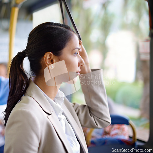 Image of Woman, thinking and commute on public transportation or bus, journey and travel to work in city. Female person, profile and trip or transit on metro, traffic and passenger or standing in vehicle