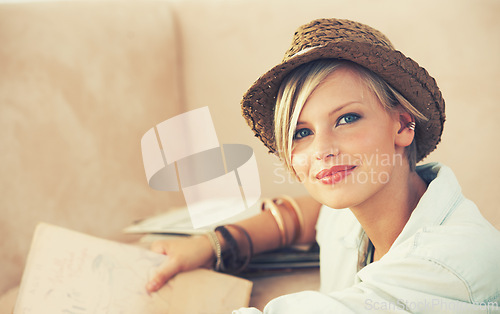 Image of Portrait, woman and relax on sofa for travel planning for rest and leisure in home in Australia. Happy female person, couch and smile to contemplate tourism idea of break, weekend and getaway