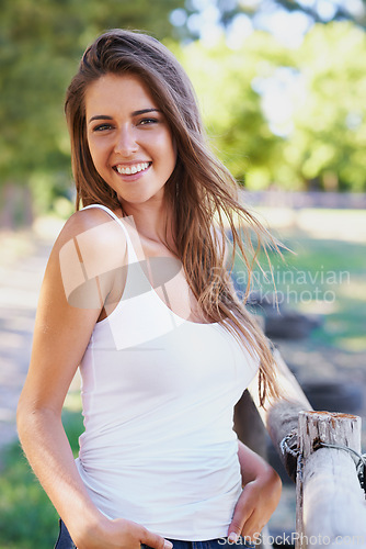 Image of Portrait, woman and laugh for summer, fashion and casual outfit with natural styling in Spain. Happy, female person and tank top for stylish, leisure and trendy clothes for rest and relaxation