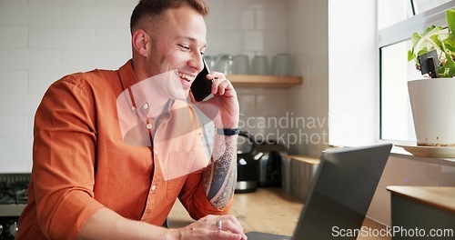 Image of Happy man, laptop and phone call in remote work for conversation or business in kitchen at home. Male person or freelancer smile talking on mobile smartphone with computer for discussion at house