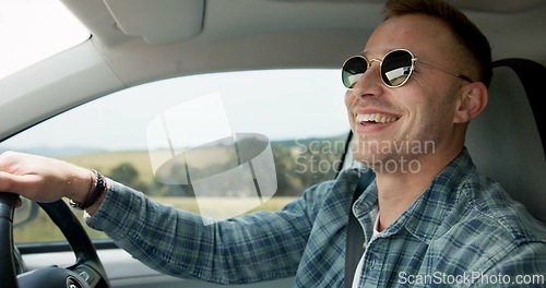 Image of Happy man, car and driving for road trip, travel or outdoor adventure in the countryside. Young male person or driver smile in vehicle for transportation, journey or vacation on street or asphalt