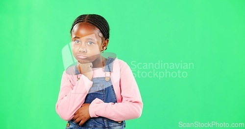 Image of Girl, child and attitude in portrait by green screen with space, promotion or pout lips with fashion. African kid, angry and frustrated with emotion, chromakey or annoyed in mockup for trendy clothes