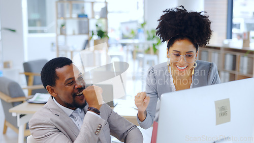 Image of Happy, business people and fist pump with computer at office for teamwork, success or achievement. Excited man and woman employee or colleagues with smile for winning, promotion or deal at workplace