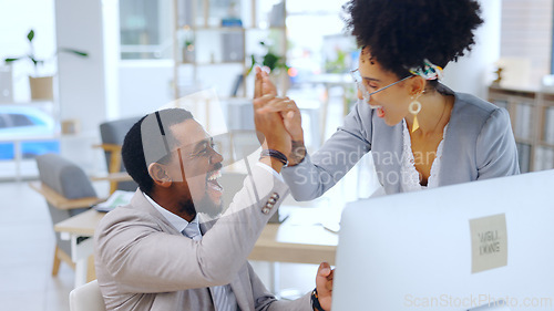 Image of Excited, business people and high five with computer at office for team success or achievement. Happy man and woman employee or colleagues touching hands for winning, promotion or deal at workplace