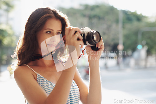 Image of Happy woman, photography and city street with camera for photo, memory or capturing outdoor moment. Female person, tourist or photographer taking picture with lens for sightseeing in an urban town